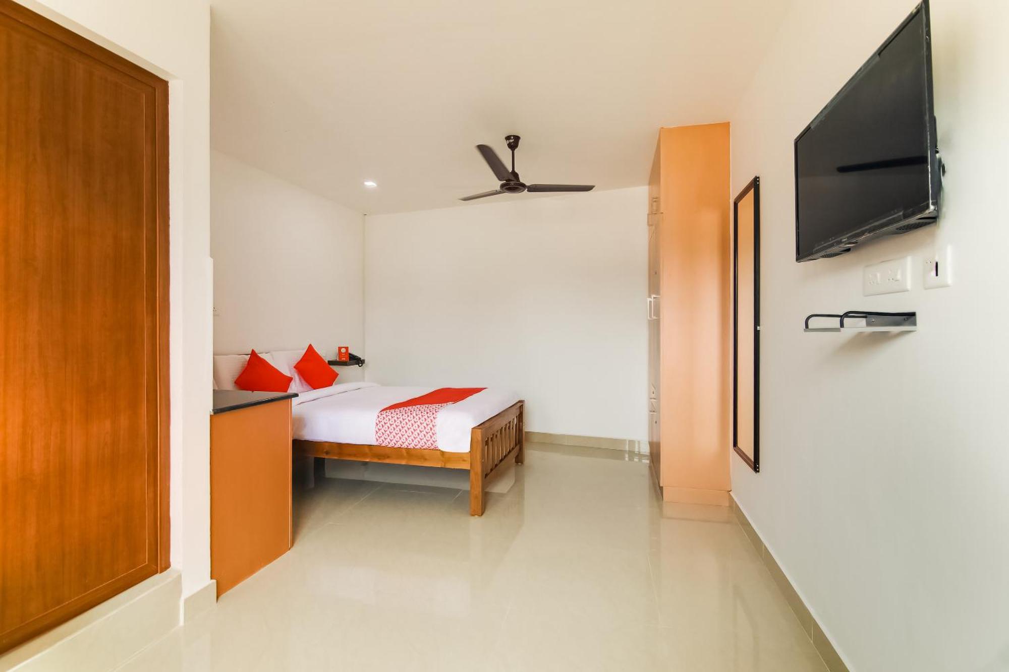 Modern Rooms Mundakayam Phòng bức ảnh